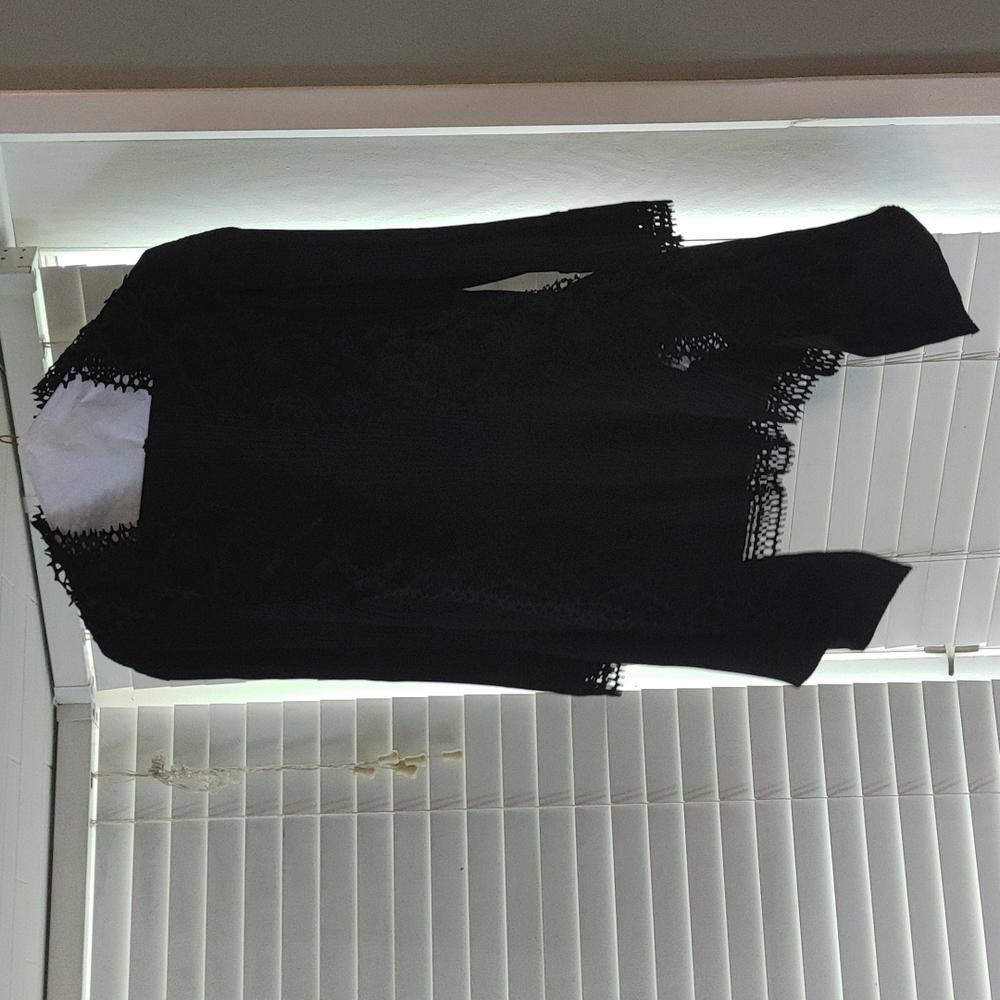 Very feminine black top